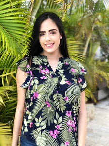 Navy blue, v-neck blouse, with ruffled sleeves, green palm fronds and purple flower pattern. 