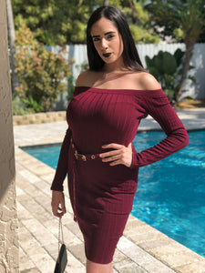 Burgundy, long sleeve, off the shoulder sweater dress with matching burgundy belt with gold accents.